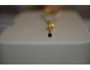 Portabobina bala bronce con punta de perla negra